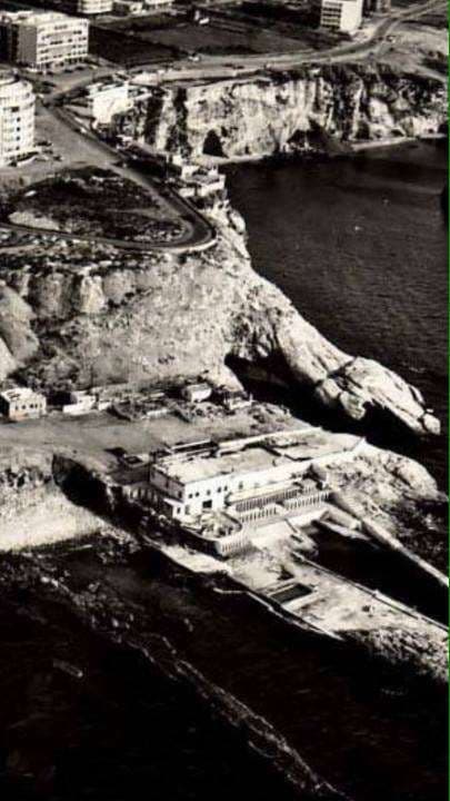 An aerial view of Sporting Club Beach on the rocky point — an archive photograph