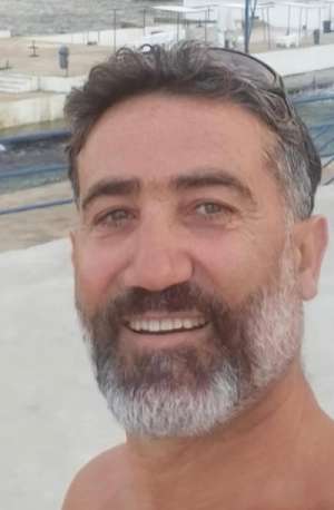 A coach at Sporting Club Beach