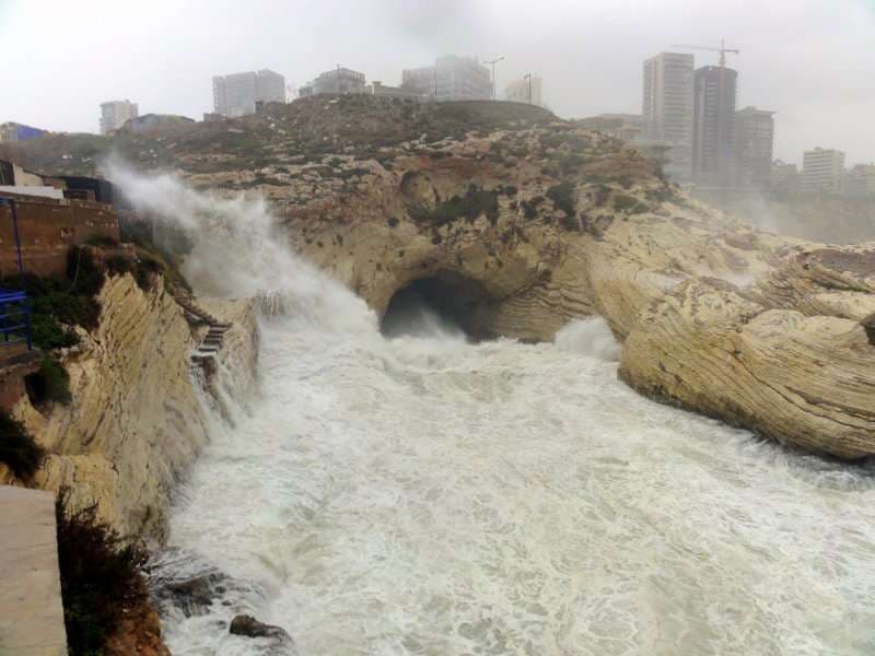 Winter storm waves breaking against the rocky coastline below Ras Beirut at Sporting Club Beach