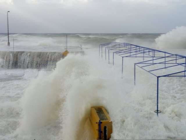 Heavy winter seas breaking over the seafront platform at Sporting Club Beach, Ras Beirut