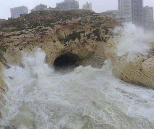 Winter waves filling a sea cave in the Ras Beirut cliffs at Sporting Club Beach