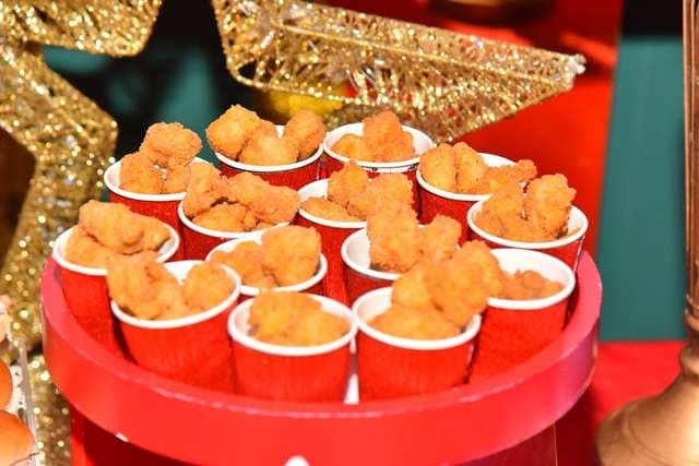 Cups of breaded chicken bites on a party buffet at Sporting Club Beach
