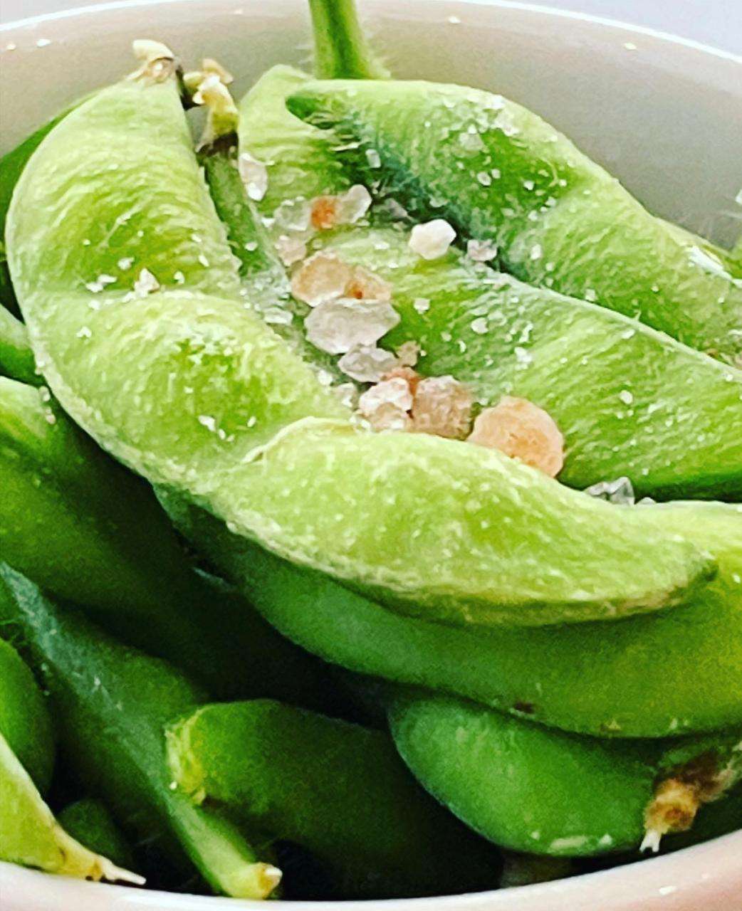 A bowl of salted edamame at Sporting Club Beach
