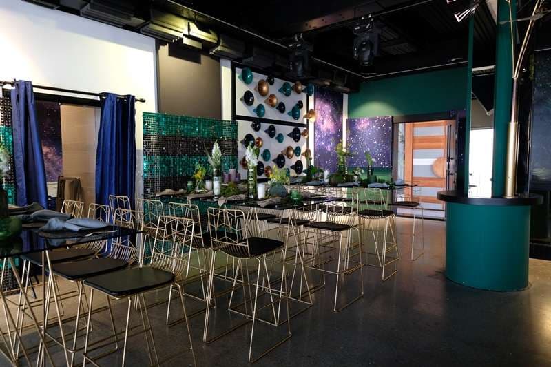 The indoor bar and lounge set up for an event at The Loft at Sporting Club Beach