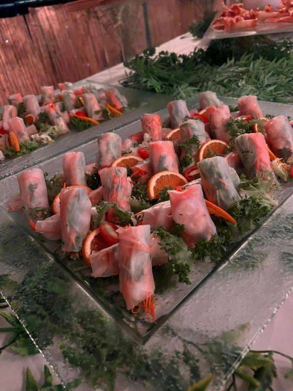 Mini pizzas with tomato, cheese and olive on wooden boards at Sporting Club Beach