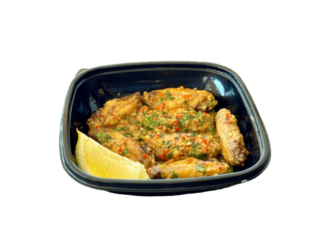 Chicken wings provençale at Sporting Club Beach