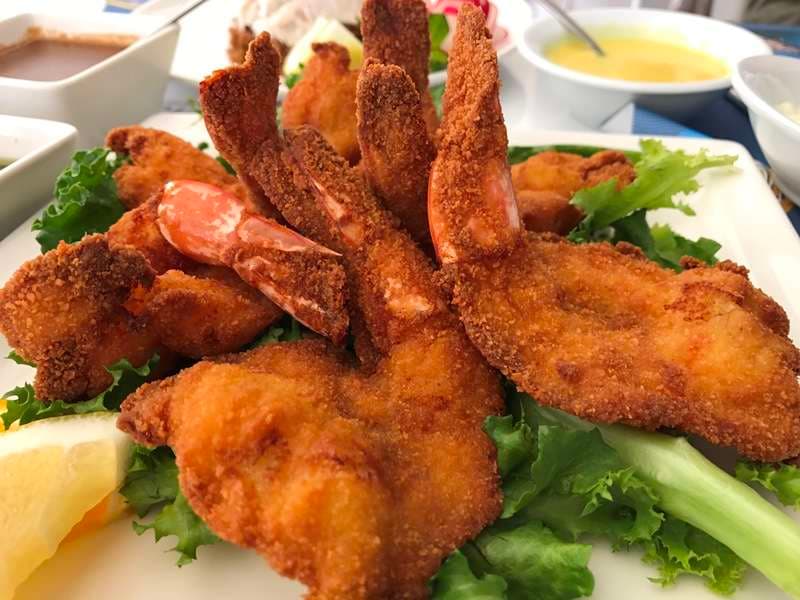 A platter of fried breaded shrimp at Sporting Club Beach