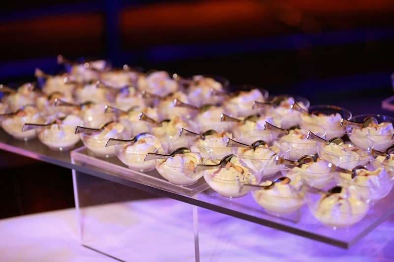 A tray of small canapé bites laid out for service at Sporting Club Beach