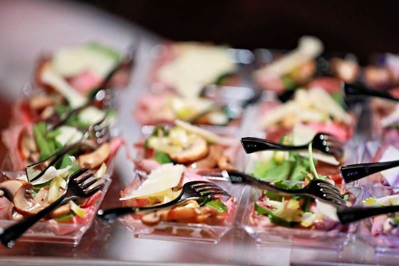 Salad cups with edamame, greens and mango in small bowls at Sporting Club Beach