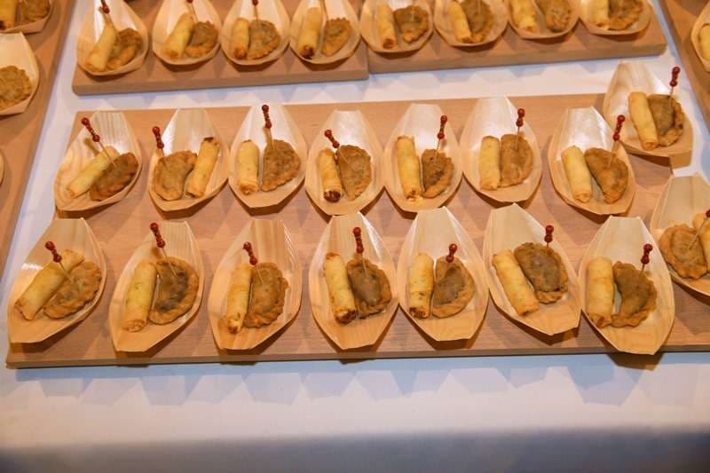 A long mezze buffet set out on the terrace at an evening event at Sporting Club Beach