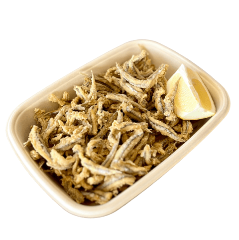 Fried small fish with lemon at Sporting Club Beach