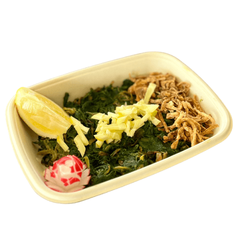 Sautéed dandelion greens with caramelised onions and lemon at Sporting Club Beach