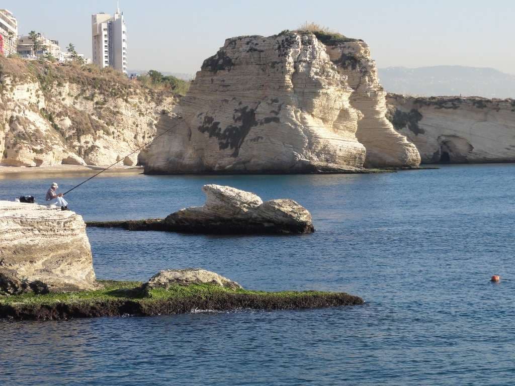 The Raouche coastline of Beirut, seen from the sea at Sporting Club Beach