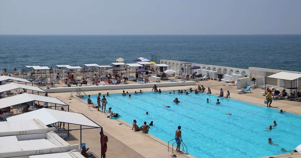 A summer day on the pool deck at Sporting Club Beach